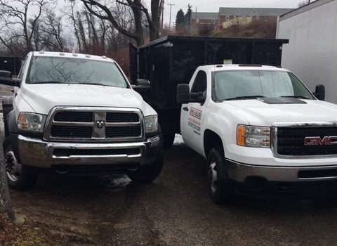 Two white trucks