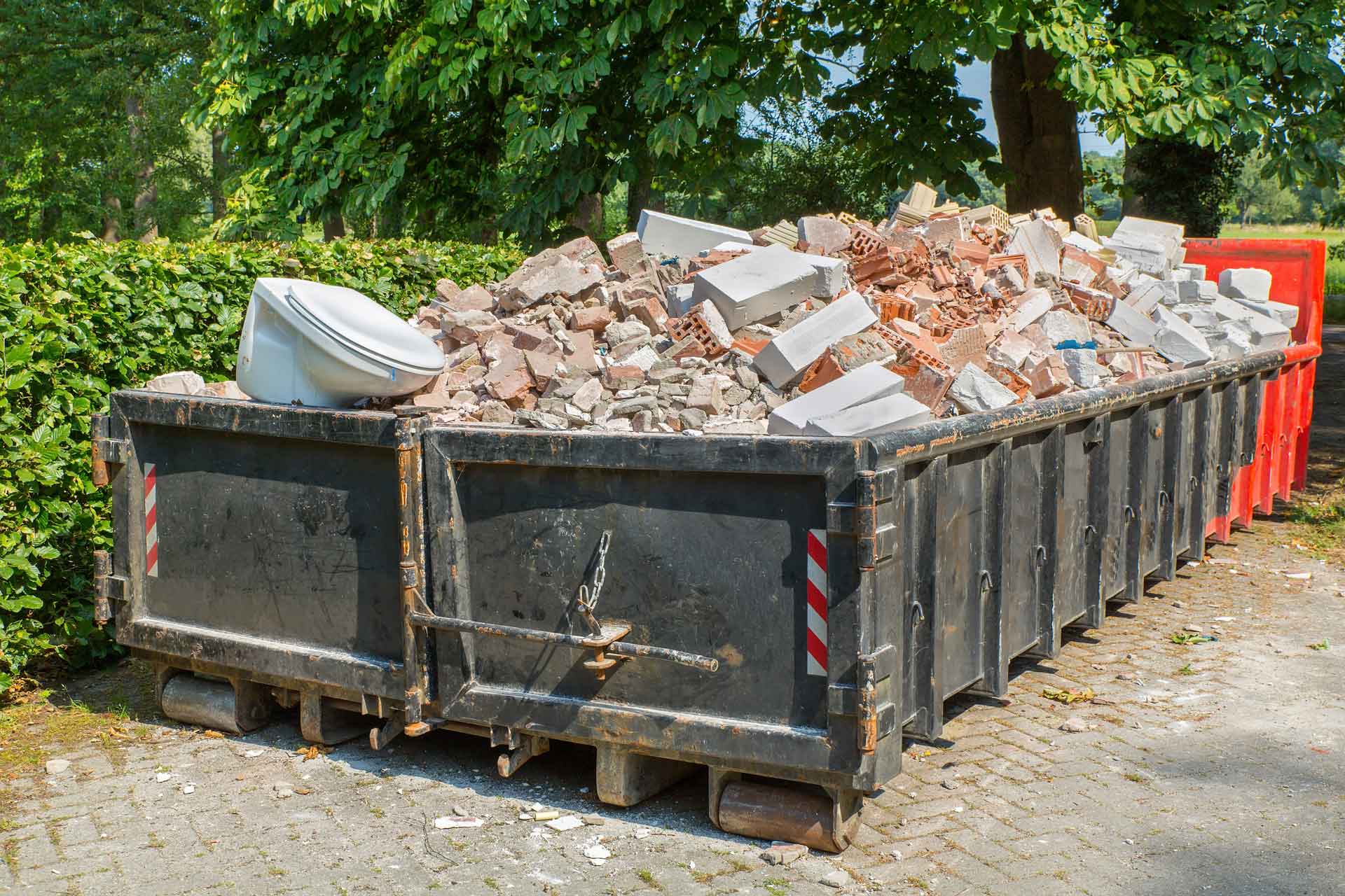 Two dumpsters full of construction waste